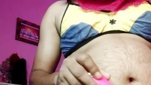 Desi hot boy has become a crossdresser so she wears a bra and gets fucked with a vibrator.