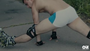 Sexy Roller Skates Guy in Tight Speedos Bulging Cock and Butt