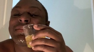 Black teen drinking his piss in front of his camera