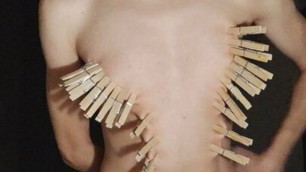 Masturbating with clothespins