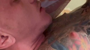 Hot Inked guy sucks the cum out of himself