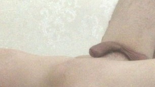 Young guy jerk off a big cock on bed, moans and cum